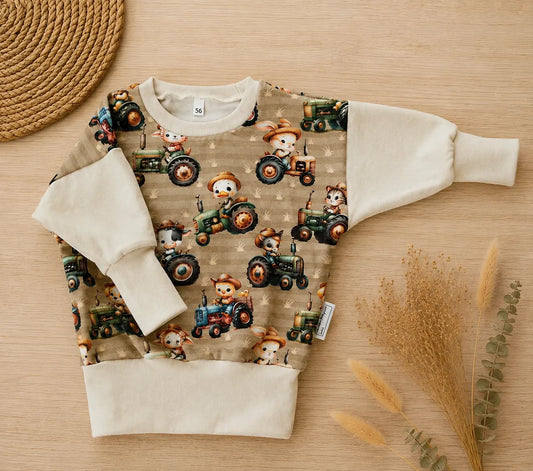 Baby-Pullover mit Traktor-Motiv