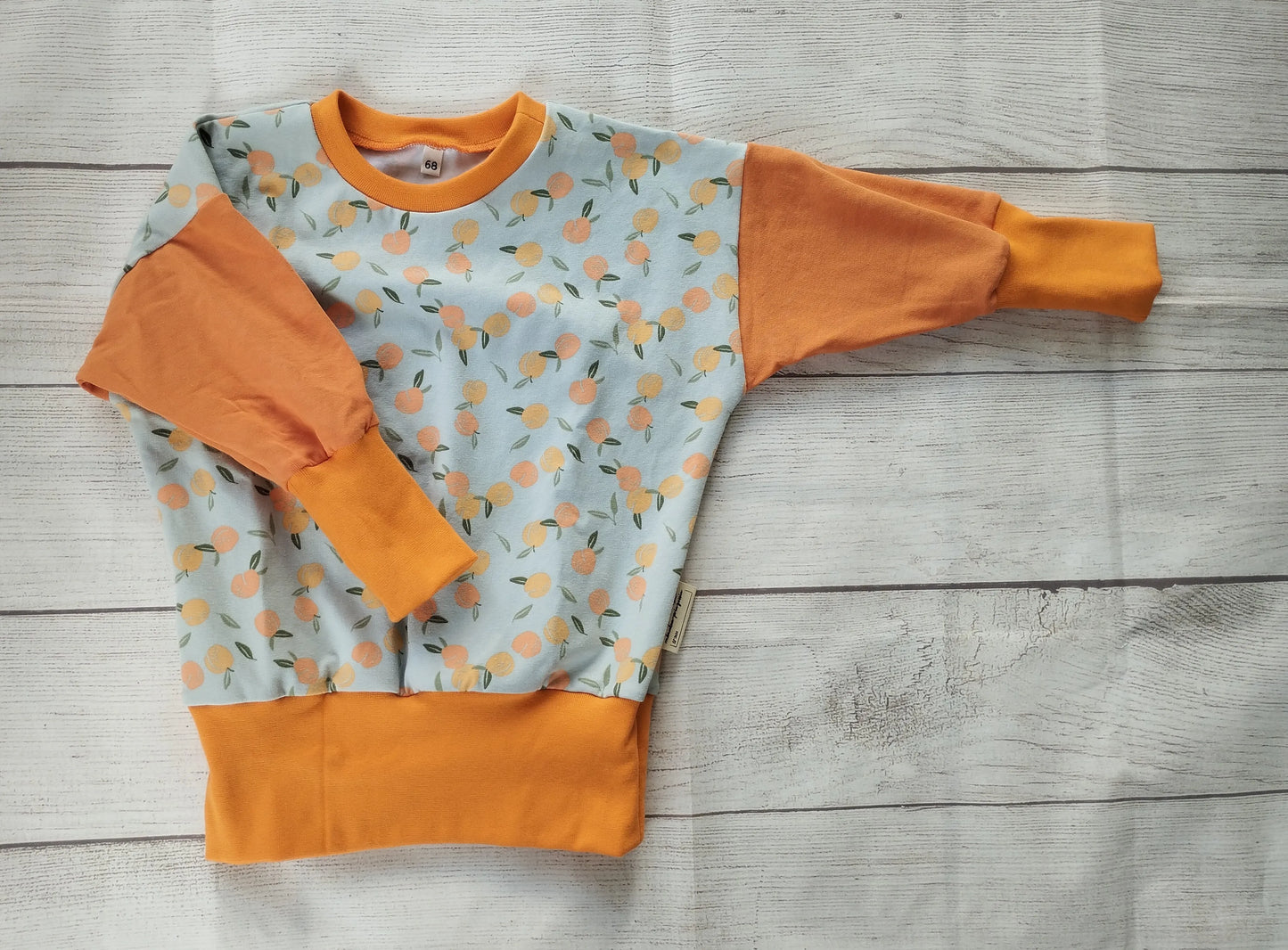 Baby-Pullover Pfirsiche